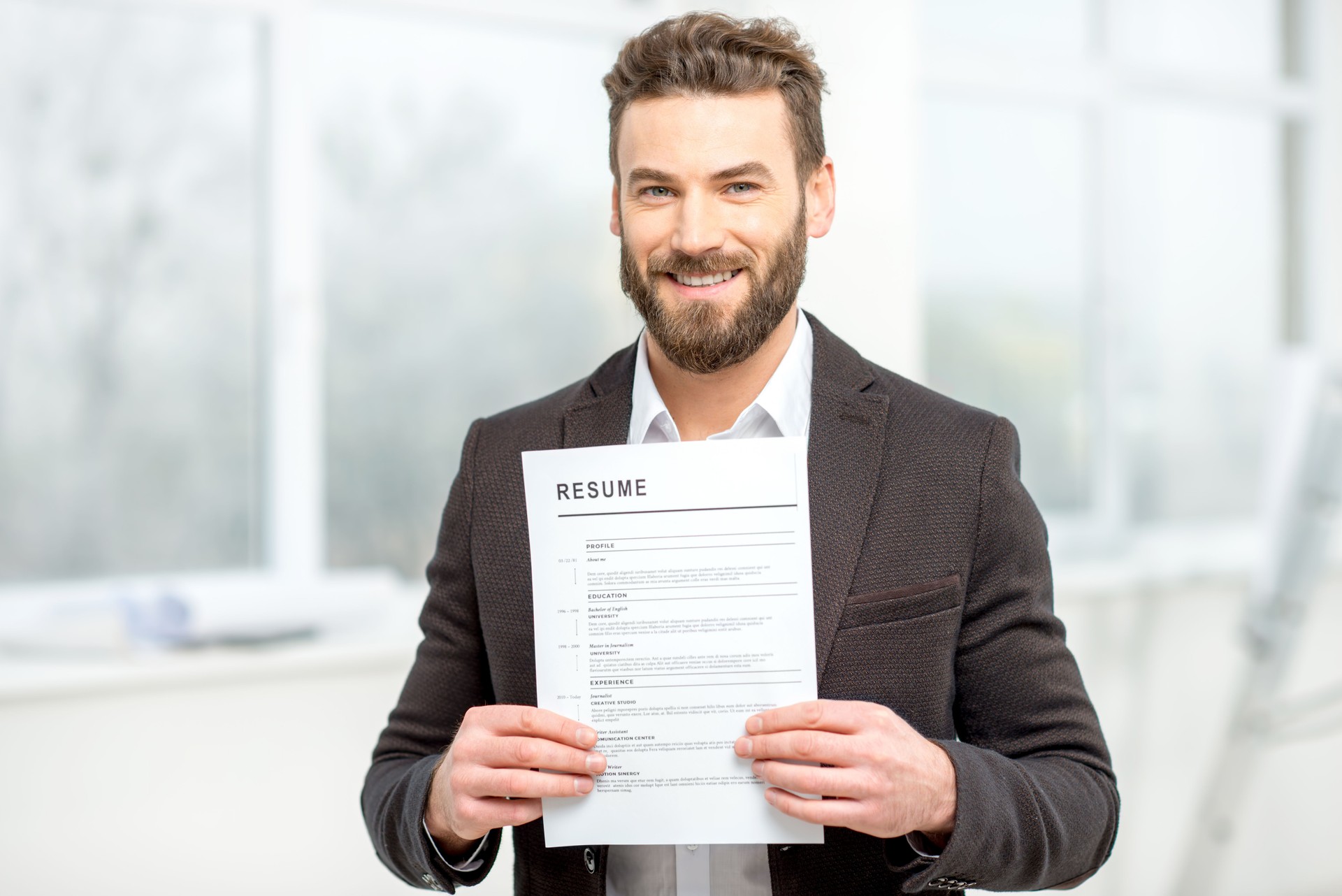 Man with resume paper
