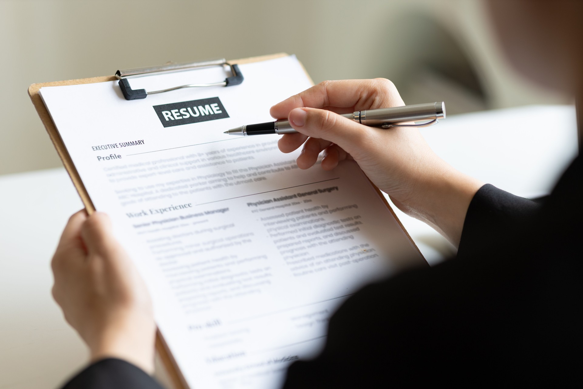 Job searching, Applicants submit application documents and resumes during job interviews in the office. Job interview